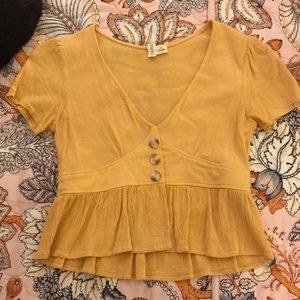 Yellow peplum blouse